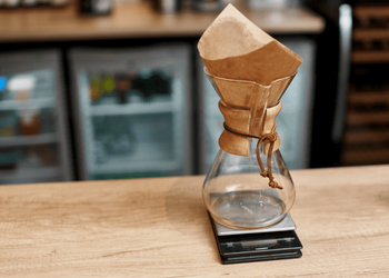 Chemex with paper filters and digital coffee scale