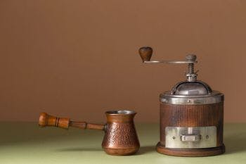 Vintage Turkish coffee grinder shown